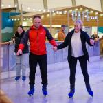Couple ice skating